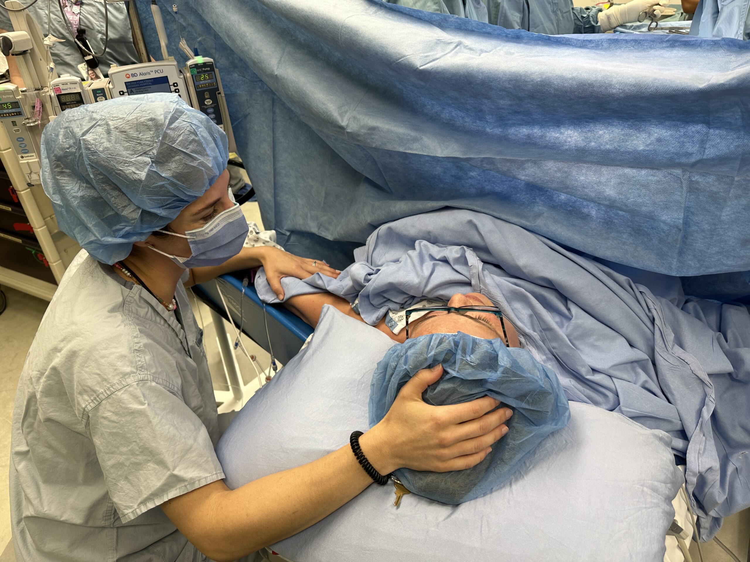 Allison supporting Ashley during her emergency c-section